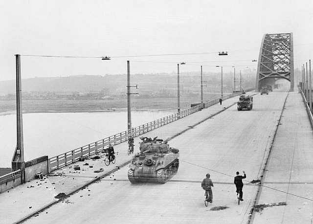 D-Day landing craft delivering troops to Normandy beach during the Allied invasion on June 6, 1944.