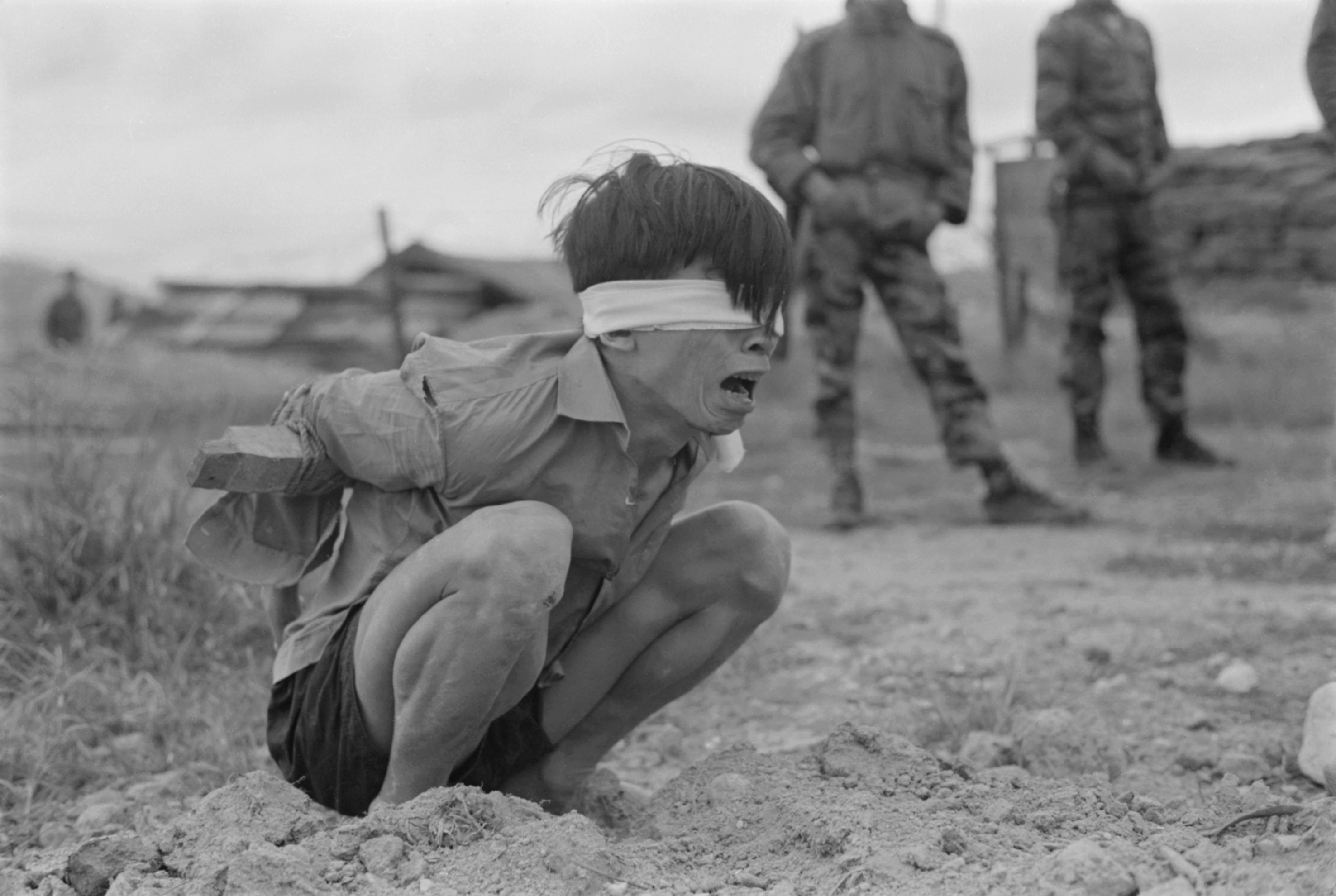 Thuong Duc, Vietnam - A Viet Cong prisoner awaits interrogation at the A-109 Special Forces Detachment in Thuong - NARA 