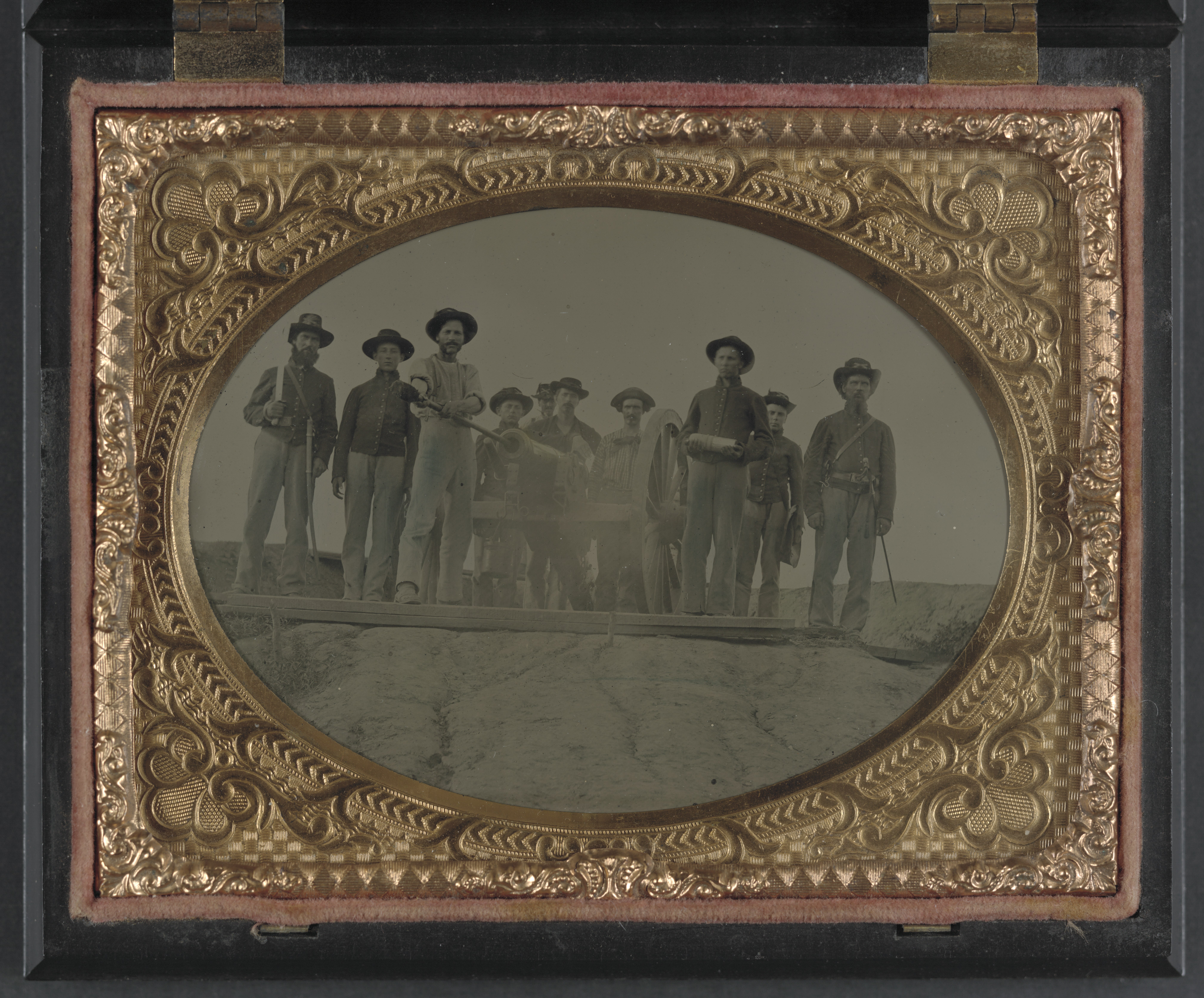 Ten unidentified artillery soldiers in Union uniforms with cannon LCCN2012647009.jpg