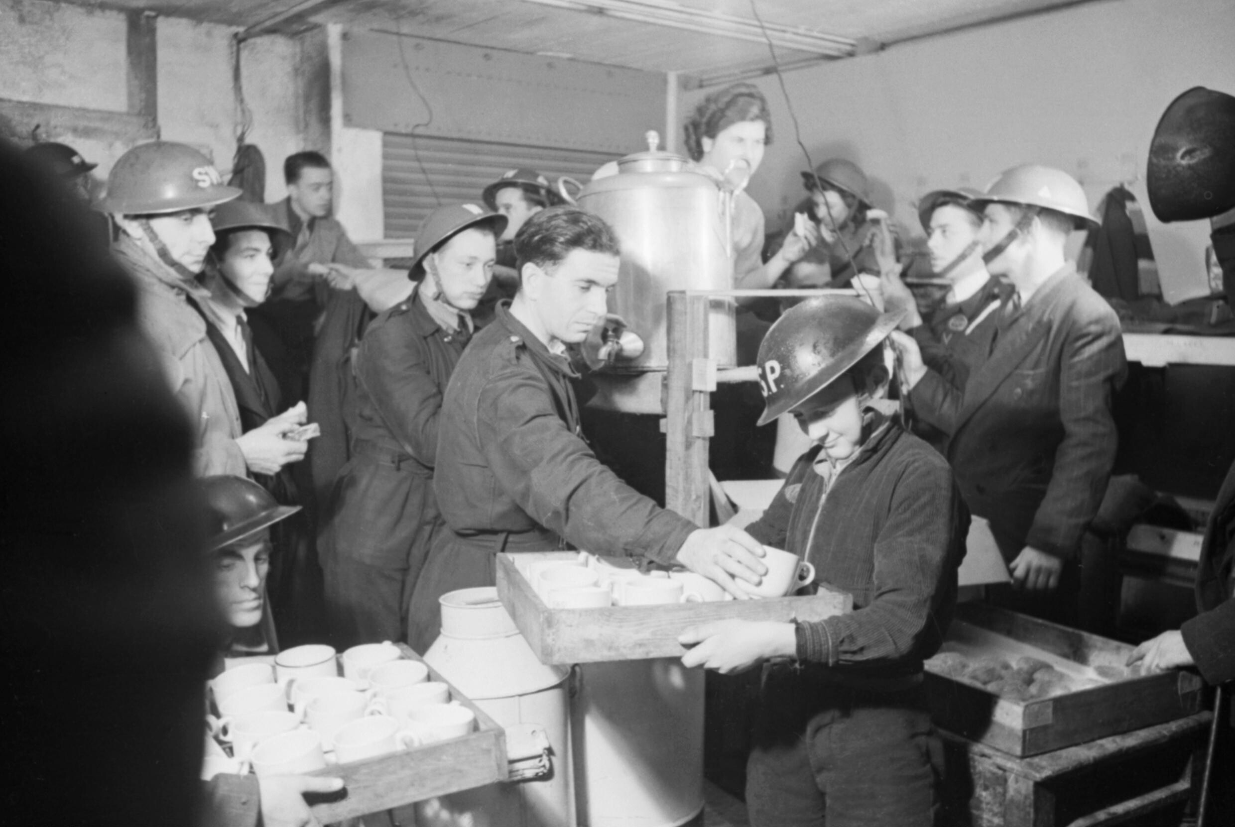 Spitfire fighter aircraft in flight, essential to Britain's defense during World War II