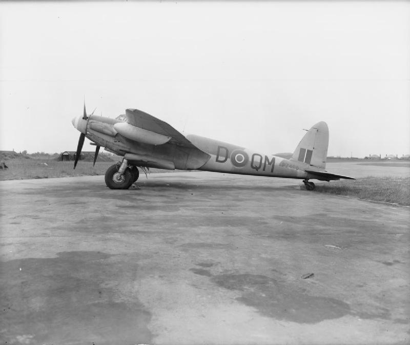 De Havilland Mosquito wooden WWII bomber aircraft in flight demonstrating innovative plywood construction technology.