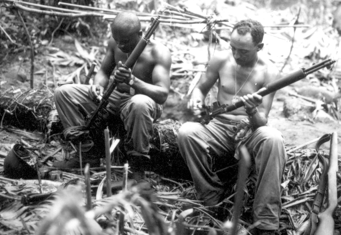 US infantry with M1 Garand rifles in WWII